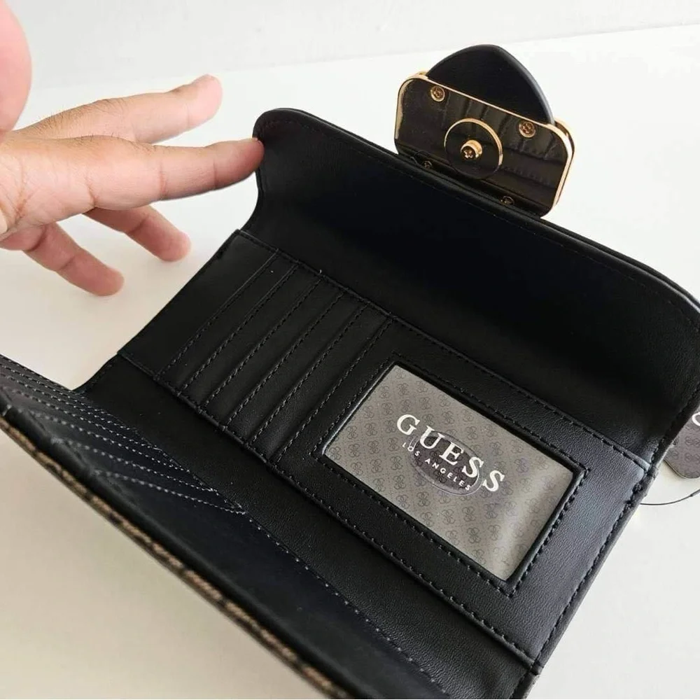 Guess • Dorchester Signature Slim Clutch in Brown